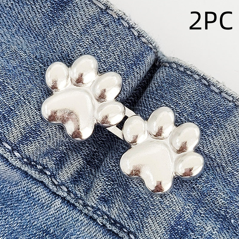 Two sets of silver dog paw waist tightener buttons, one pair shown on a denim waistband, labelled 2PC