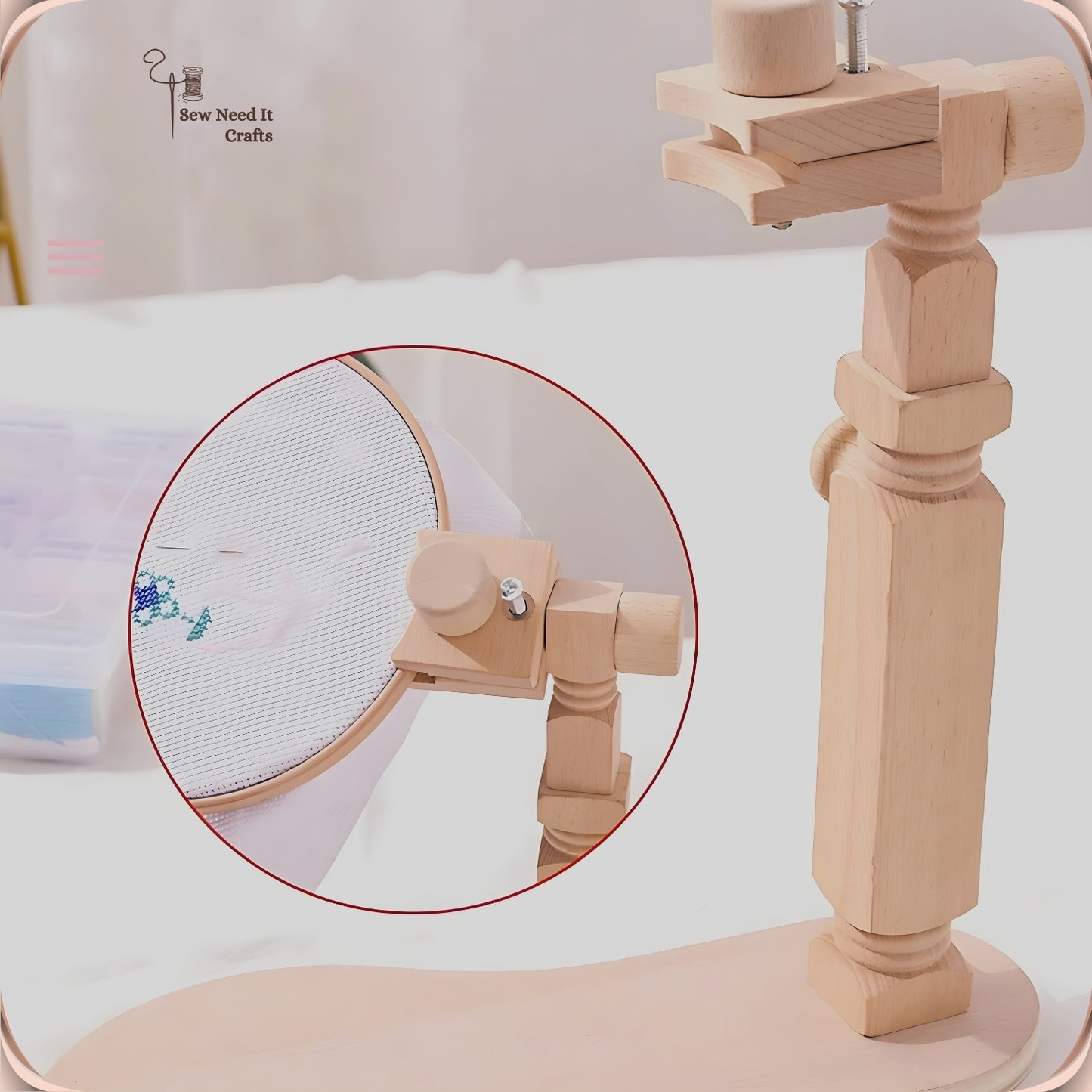 Close-up of the beech clip head gripping the rim of an embroidery hoop, with the wooden tightening knob and steel screw visible