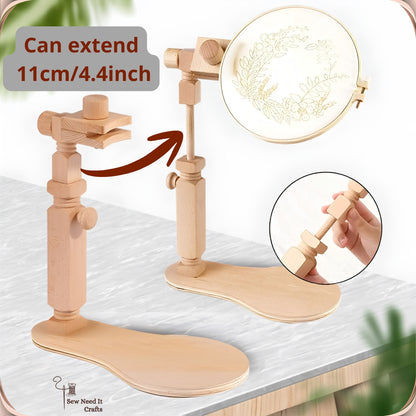 The stand shown low and raised on a tabletop, extending 11 cm to bring the hoop up to eye level