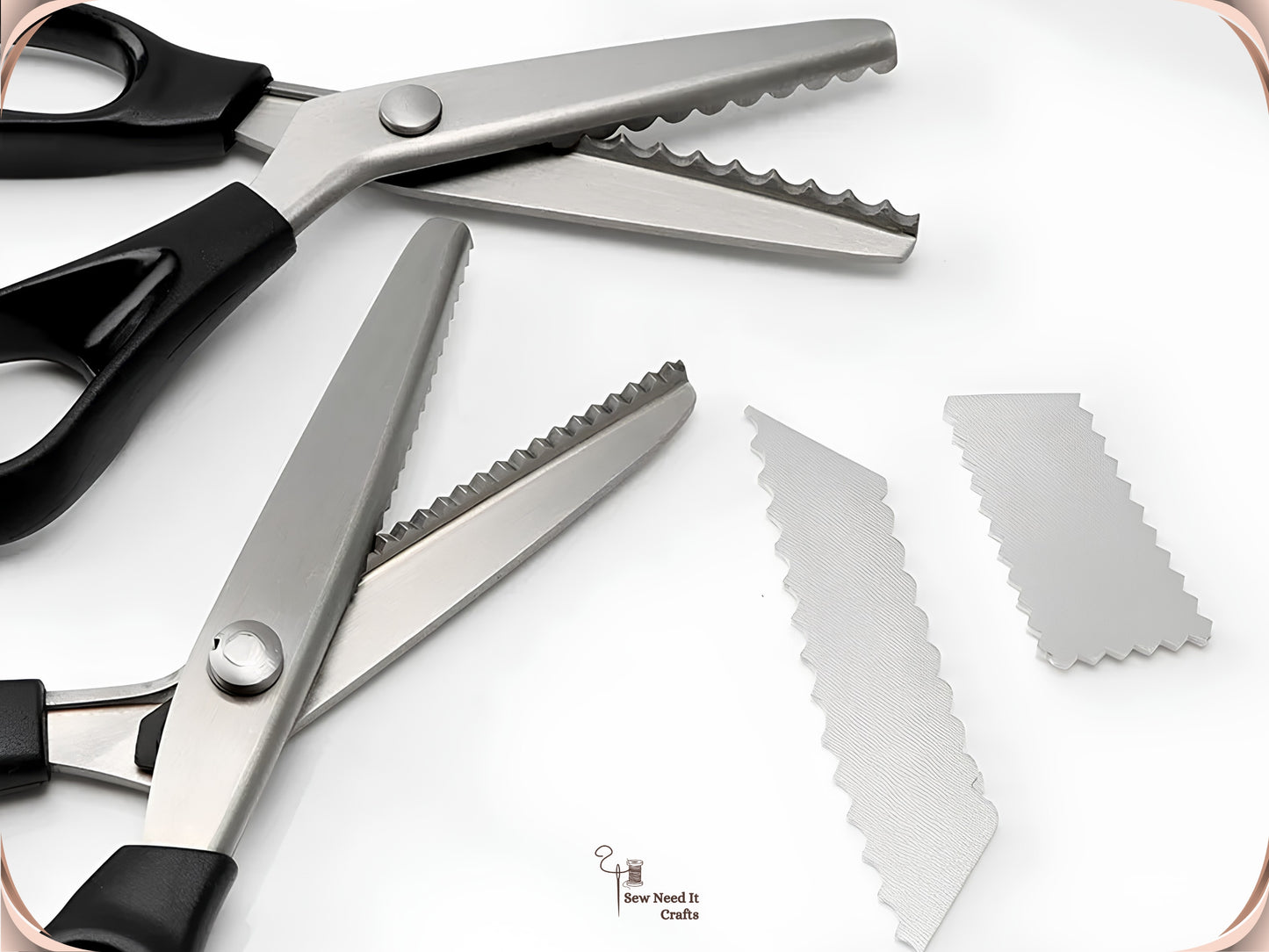 Close-up of two open pinking shears on white, one scalloped and one zigzag, beside two cut strips showing the wavy and sawtooth edges each blade produces