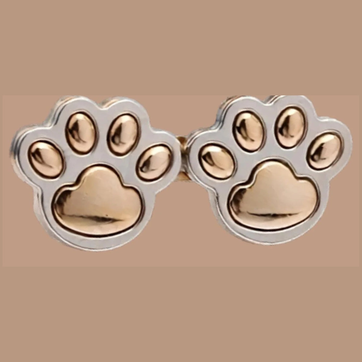 Bright gold paw print waist adjuster set, gold paw pads in a silver rim