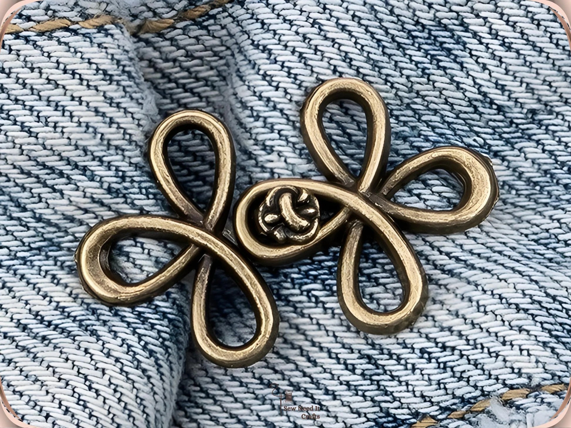 Bronze clover flower waist adjuster, one set, clipped to a denim waistband