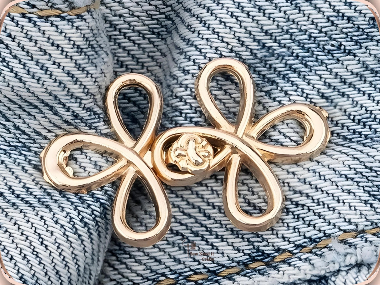Golden clover flower waist adjuster, one set, clipped to a denim waistband