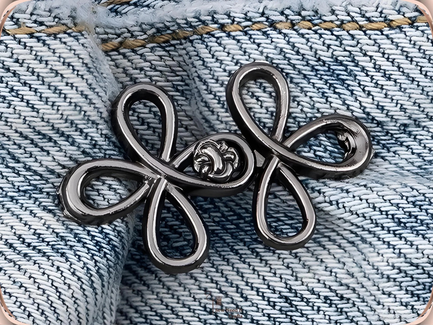 Gunmetal clover flower waist adjuster, one set, clipped to a denim waistband