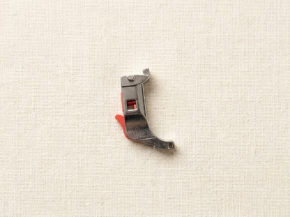 Flat lay of new style Bernina snap-on shank adapter