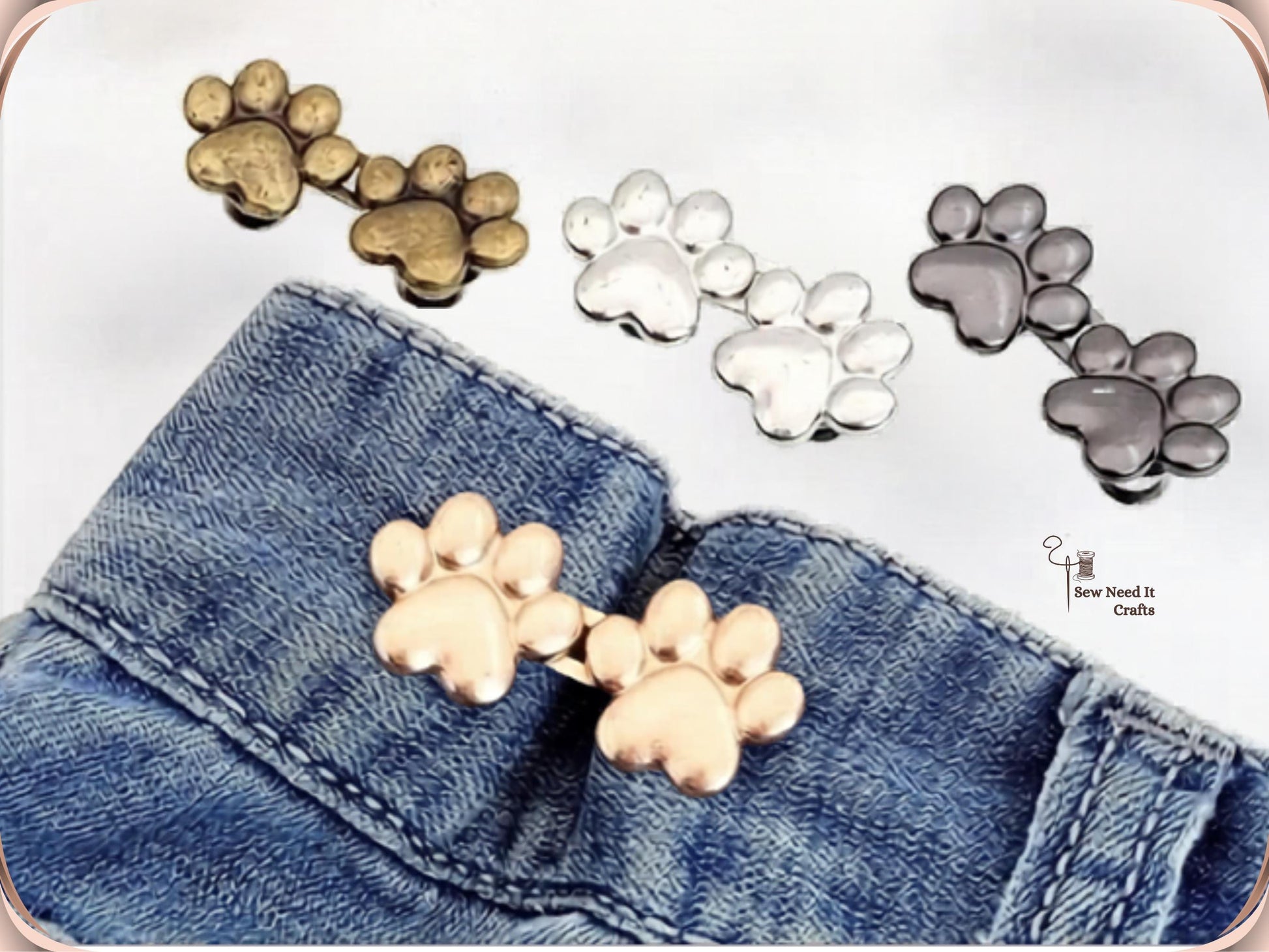 A loose gaping denim waistband on the left, cinched closed on the right with a silver paw waist adjuster
