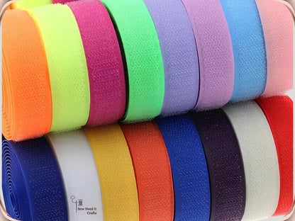 Rows of 20 mm hook and loop tape rolls in orange, yellow, pink, green, purple, blue, white and red