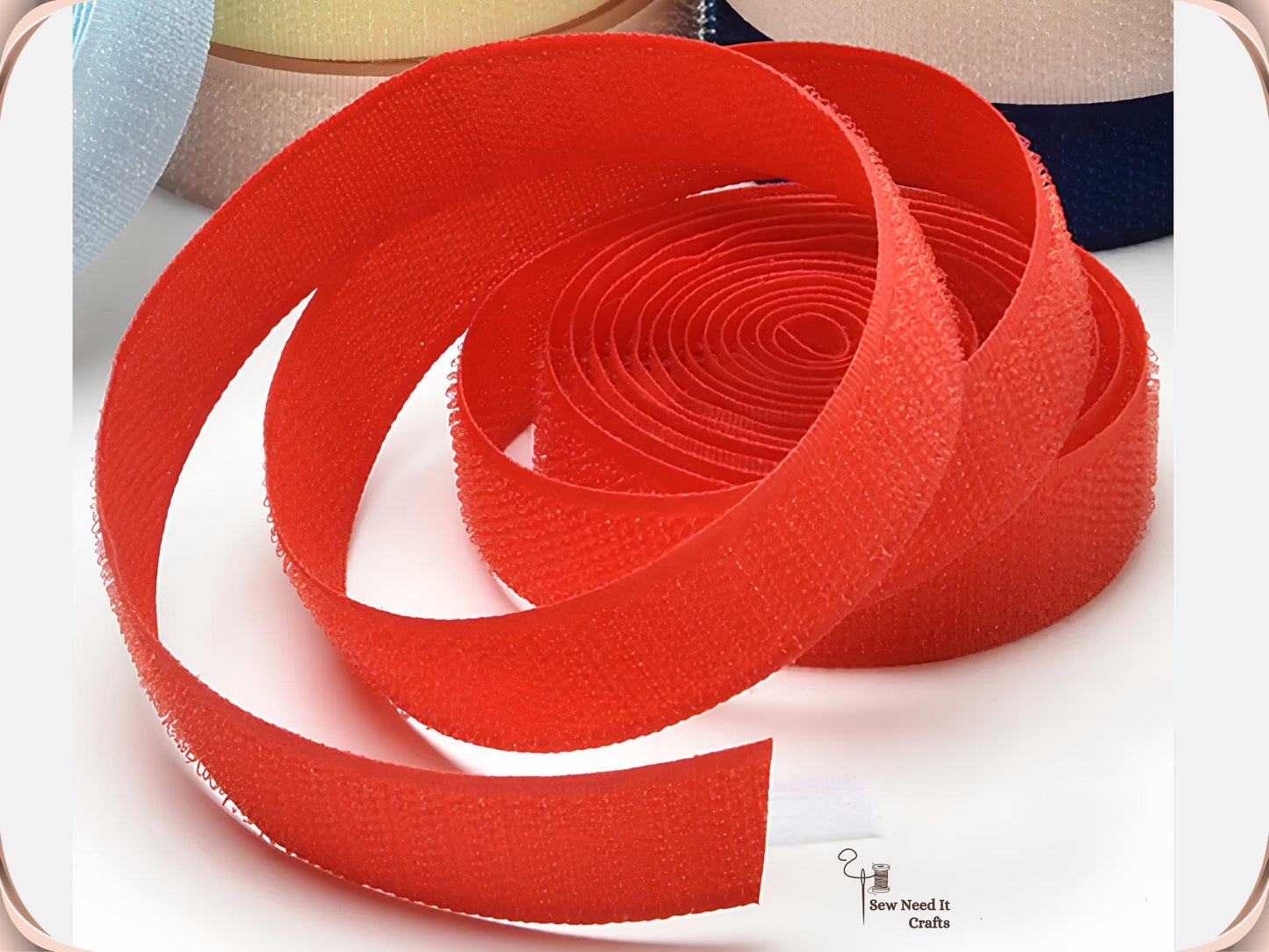 Red 20 mm sew-on hook and loop tape uncoiled to show the hook surface and the length of the roll
