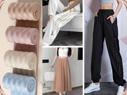 Striped elastic band used in finished garments including white joggers with a side stripe, a tan pleated skirt with an elastic waistband and black joggers with a decorative side panel