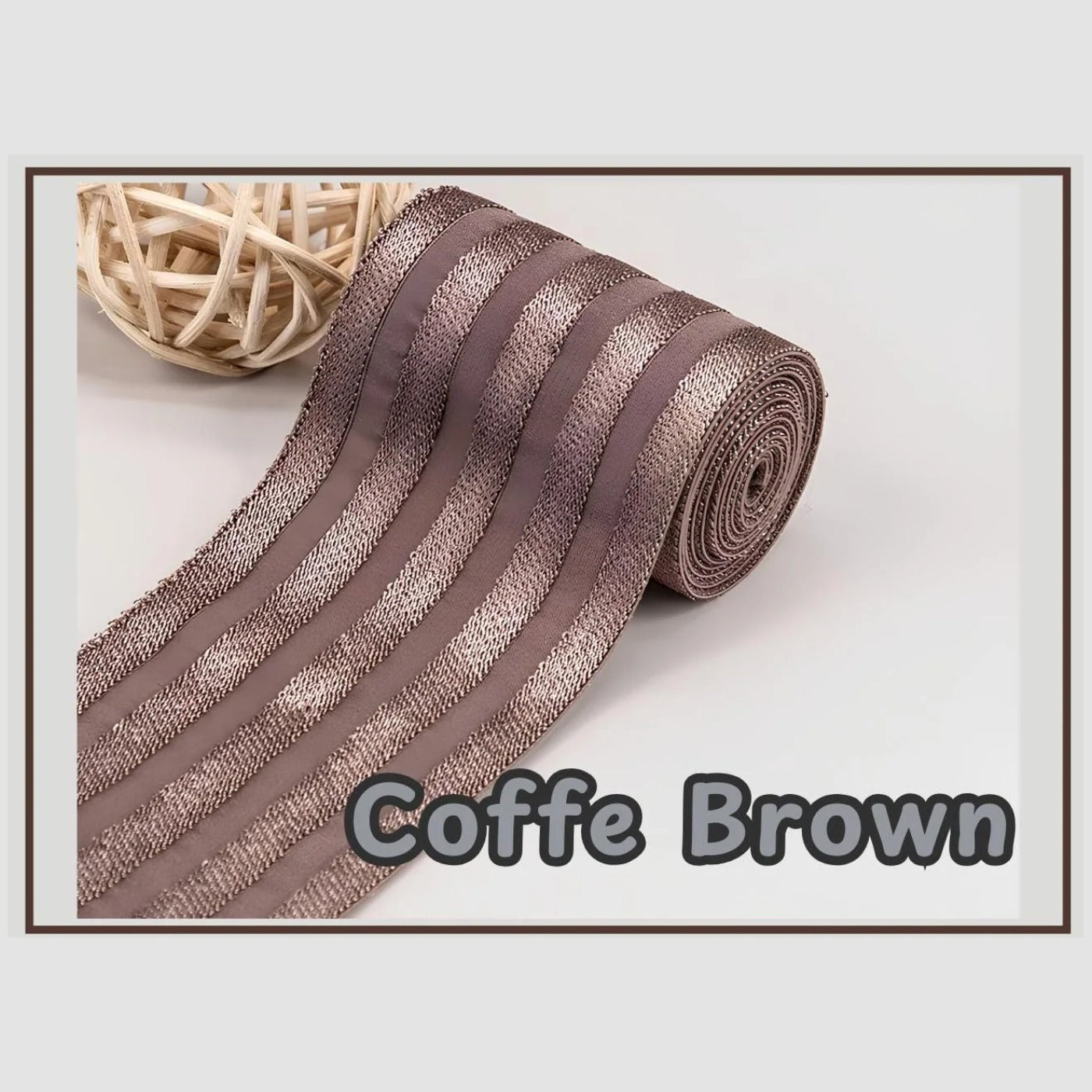 Coffee brown 2 inch satin stripe elastic band for sewing, partly rolled and labelled Coffee Brown