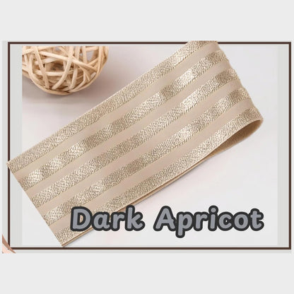 Dark apricot 2 inch satin stripe elastic band for sewing, folded flat and labelled Dark Apricot