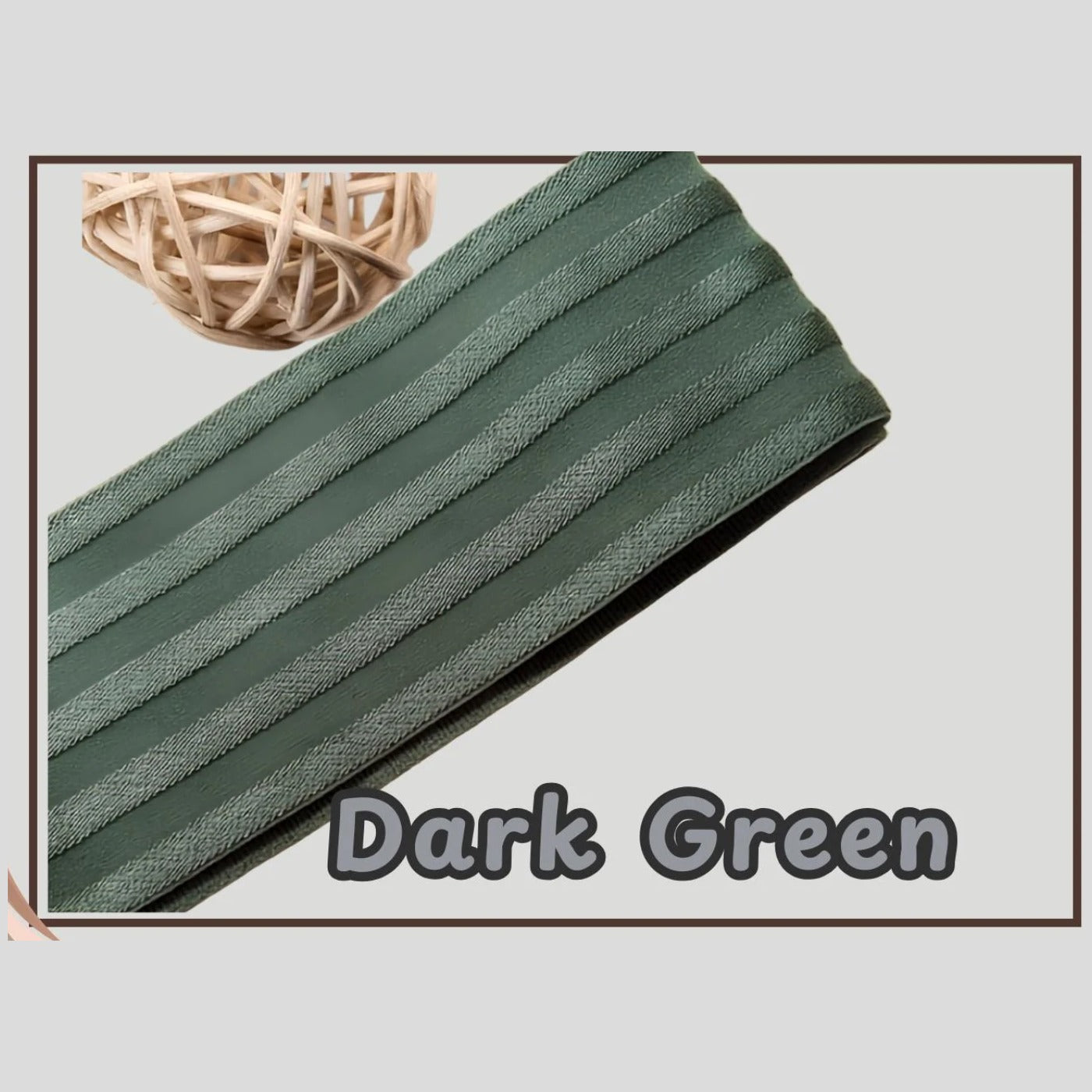 Dark green 2 inch satin stripe elastic band for sewing, folded flat and labelled Dark Green