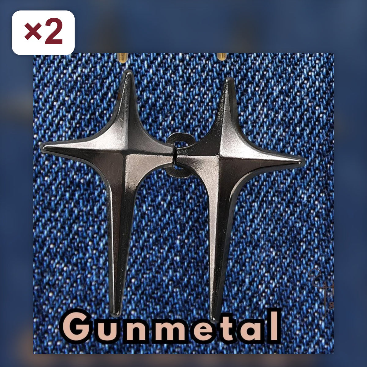 Two sets of gunmetal four-point star no-sew waist tightener pins