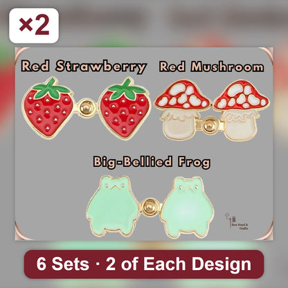 Six sets of no-sew waist tightener pins, two of each design: red strawberry, red mushroom and big-bellied frog