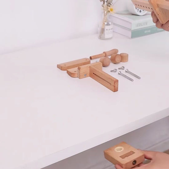 Assembly video showing the beechwood embroidery stand being clamped to a table edge, the upright and jointed arm fitted, and an embroidery hoop clamped into the wooden splint