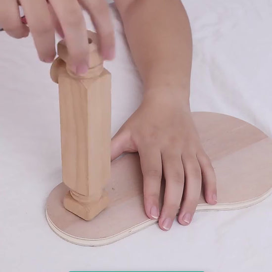 Video showing the beech embroidery stand being assembled by hand in four parts, then a hoop clipped in and stitched two-handed