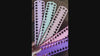 Video: numbered floss drop boards fanned out in several colours, floss looped through the numbered holes and boards laid flat