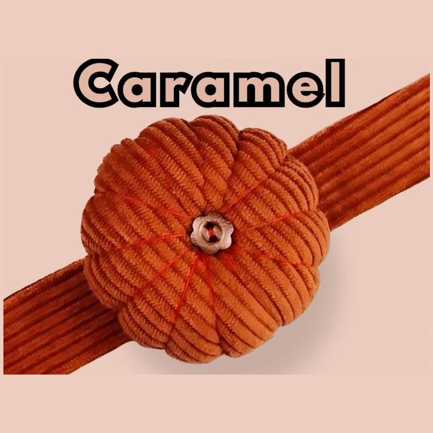 Caramel corduroy pumpkin pin cushion on its matching caramel wrist band