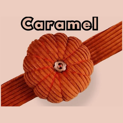 Caramel corduroy pumpkin pin cushion on its matching caramel wrist band