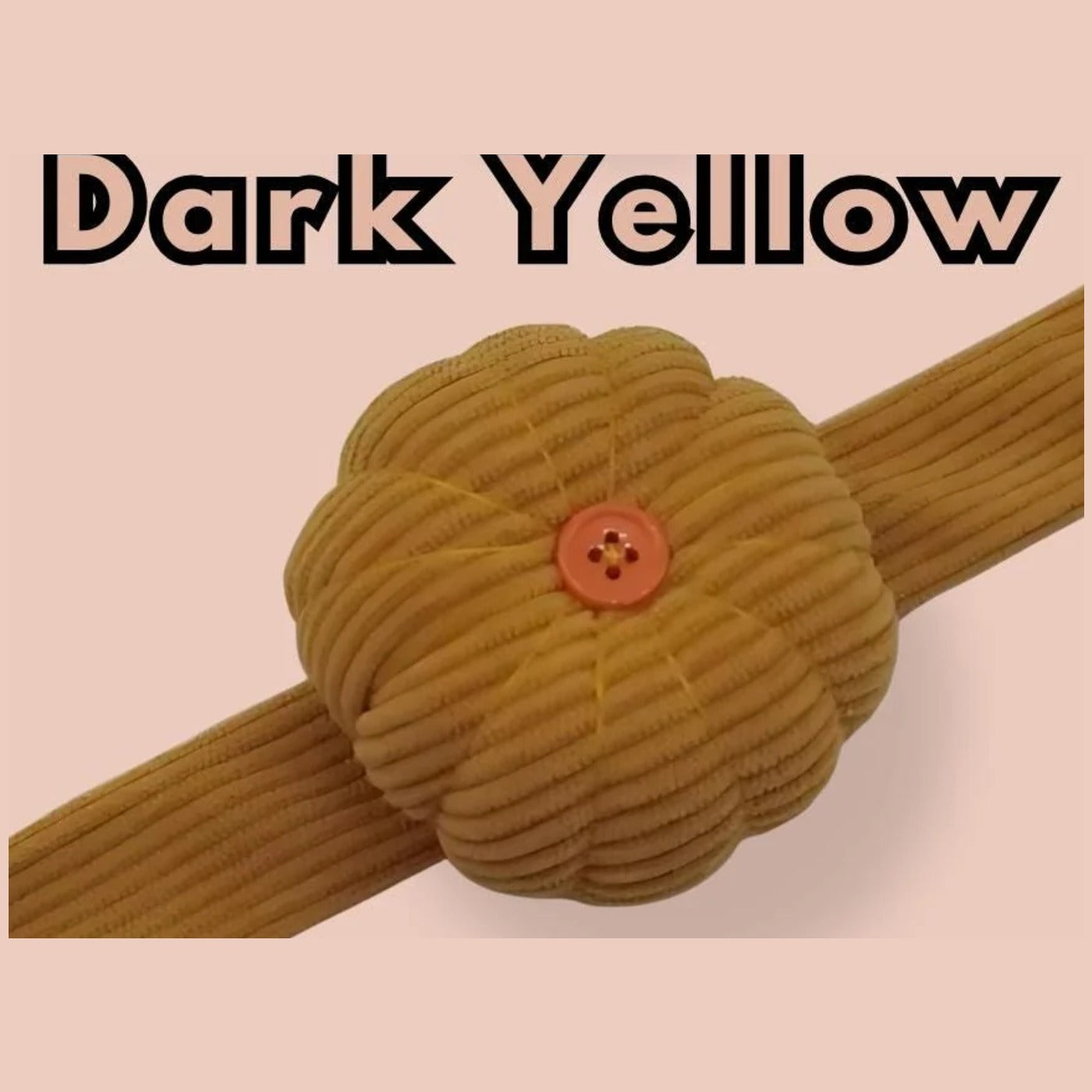 Dark yellow corduroy pumpkin pin cushion on its matching mustard wrist band