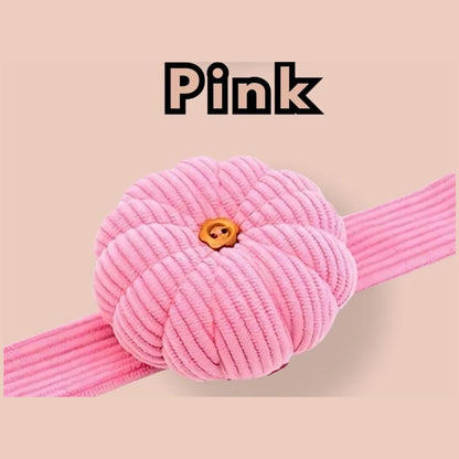 Pink corduroy pumpkin pin cushion on its matching bright pink wrist band
