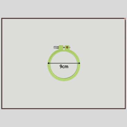 Green round plastic embroidery hoop, 9 cm inside diameter