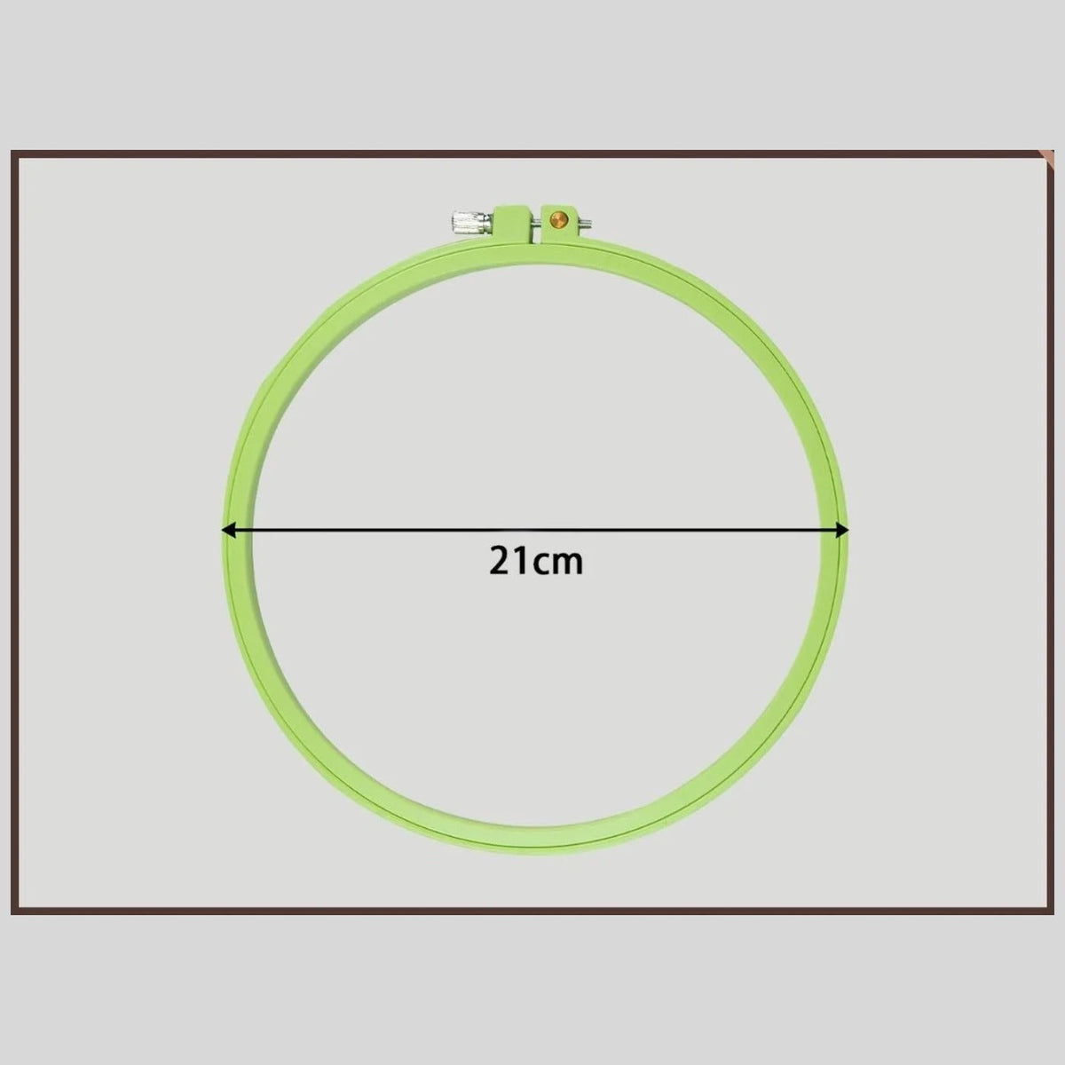 Green round plastic embroidery hoop, 21 cm inside diameter