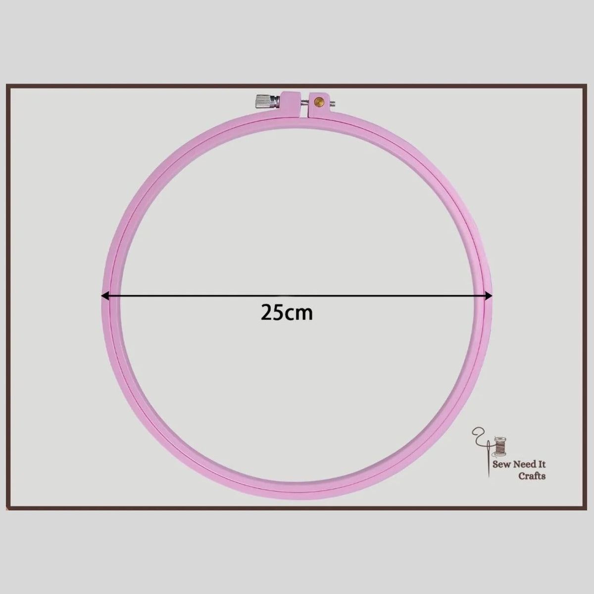 Pink round plastic embroidery hoop, 25 cm inside diameter