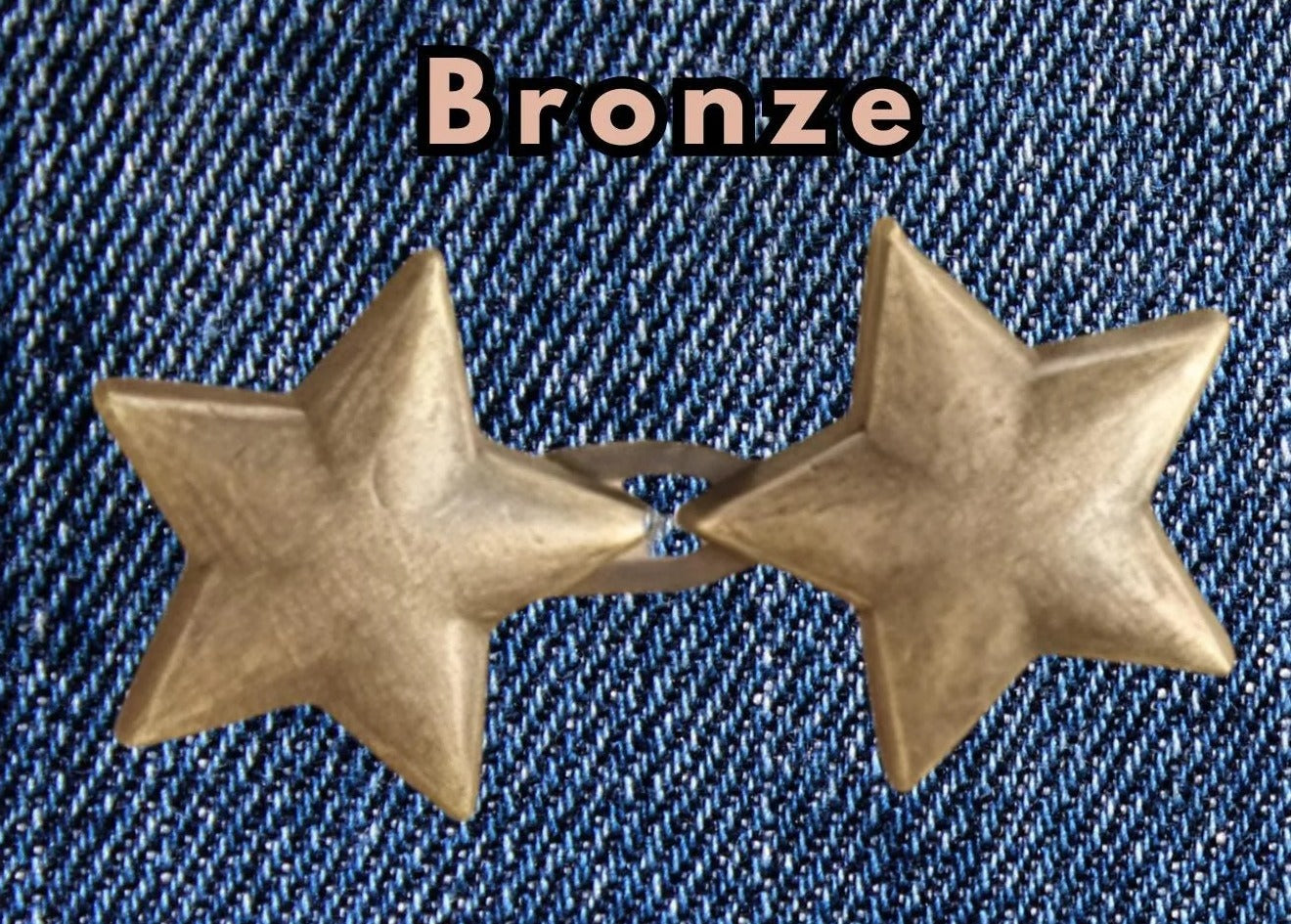 Bronze star shape waist adjuster, one set, clipped to a denim waistband
